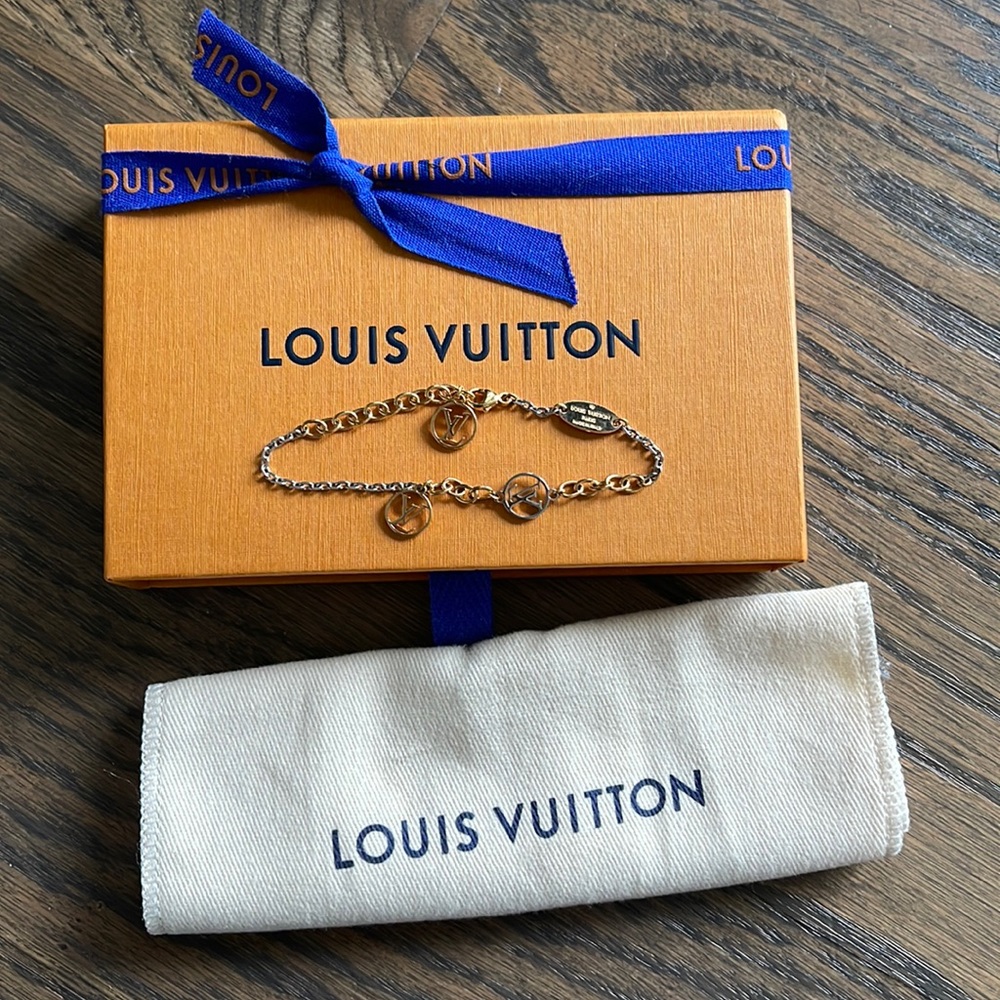 Louis Vuitton metal LV bracelet.